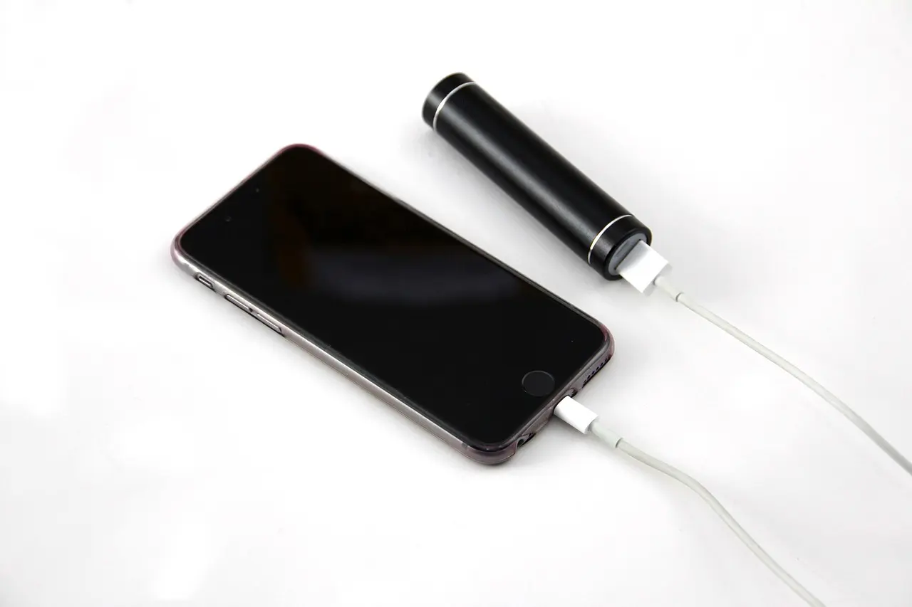 A phone charging from a portable battery pack