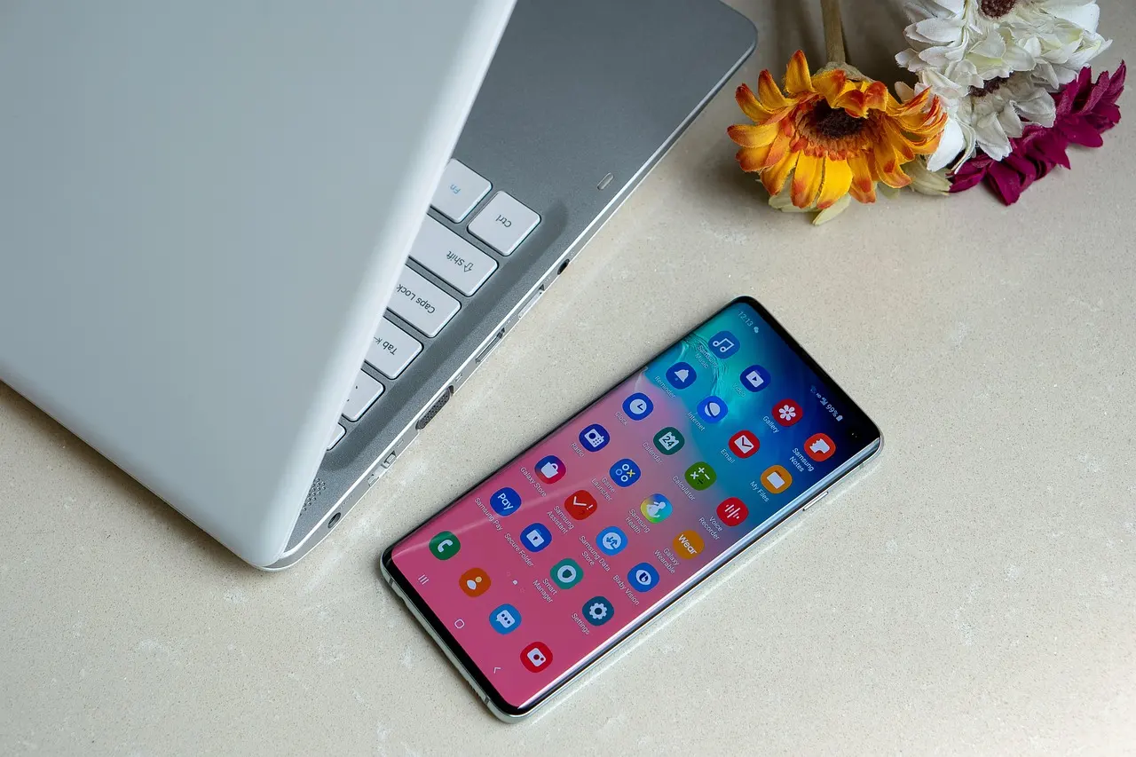 A Samsung Galaxy phone held in one hand