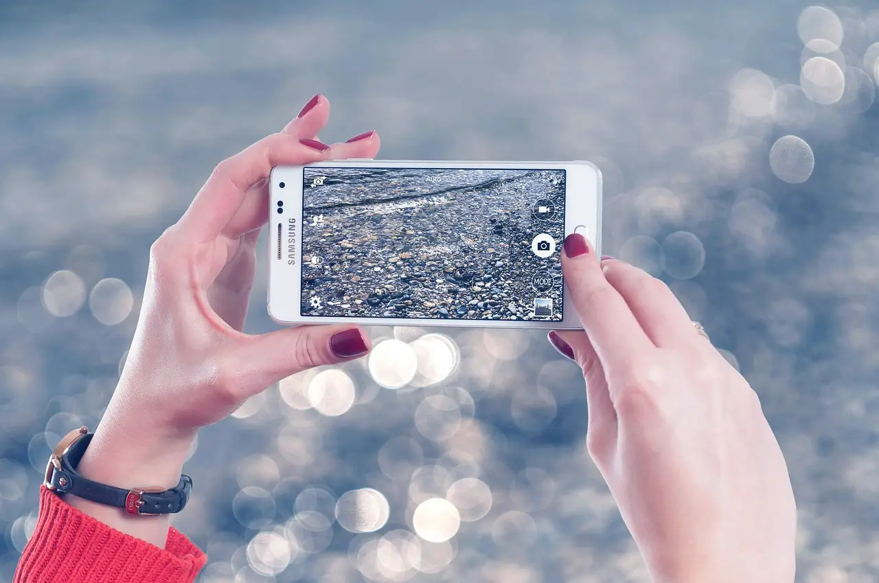 A person holding a smartphone.