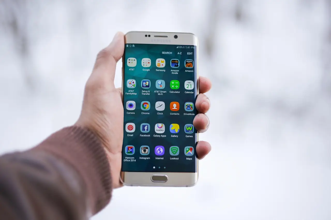 A person holding a Samsung smartphone.