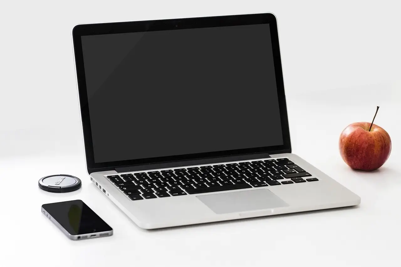 A laptop and a smartphone on a desk