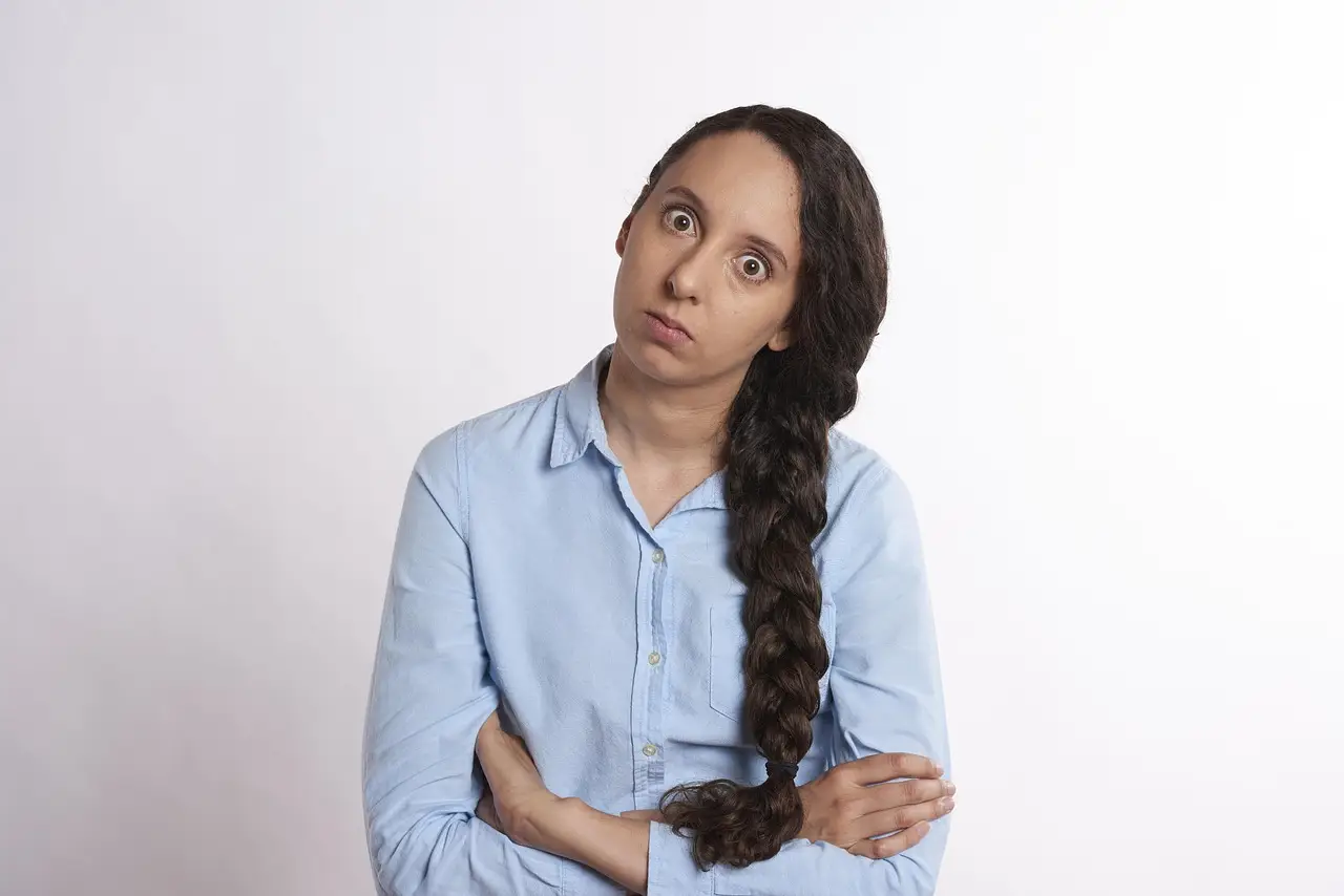 A frustrated young woman at her computer
