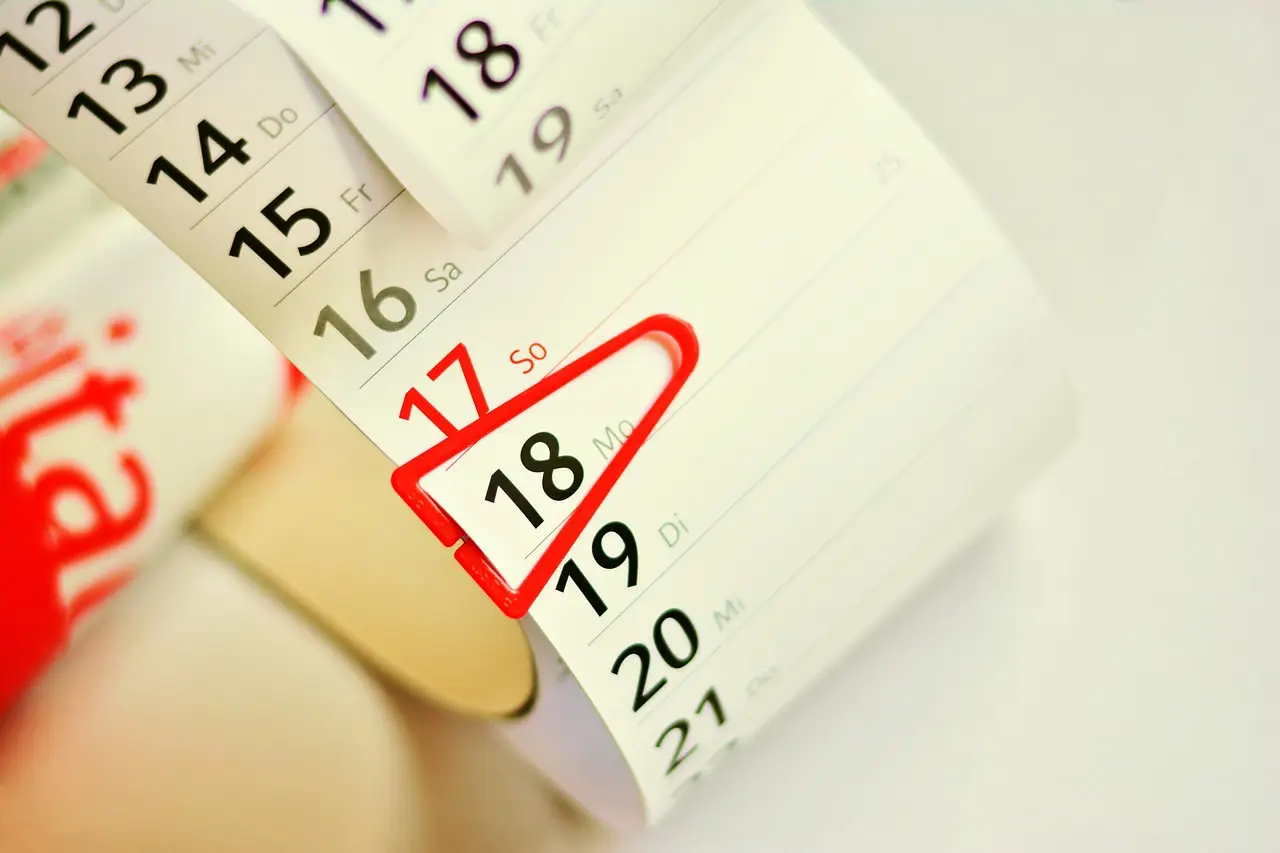 A tear-off strip calendar showing dates for planning ahead