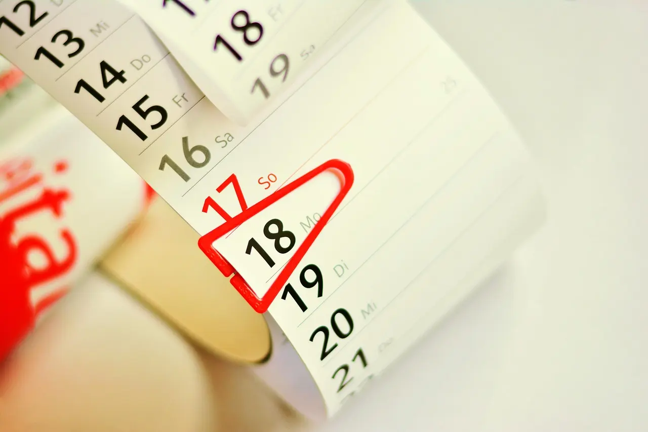 A tear-off strip calendar showing dates for planning ahead